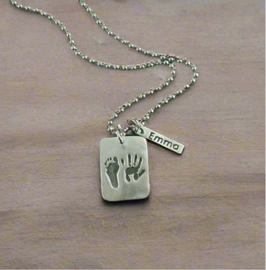 Fine silver dog tag pendant for men, personalized with real hand and/or footprints. A meaningful keepsake to honor a loved one's unique touch.