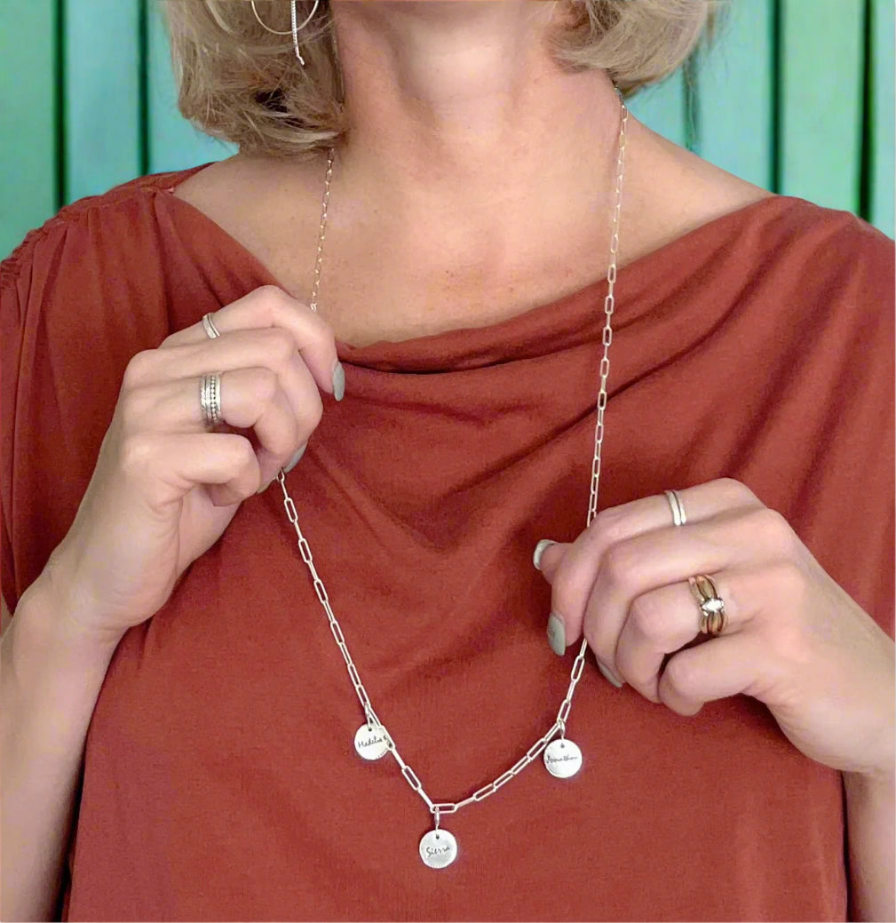 Sterling silver paperclip necklace with three custom 99.9% fine silver mini disc charms, designed for versatile wear as a long, short, lariat-style necklace or bracelet.
