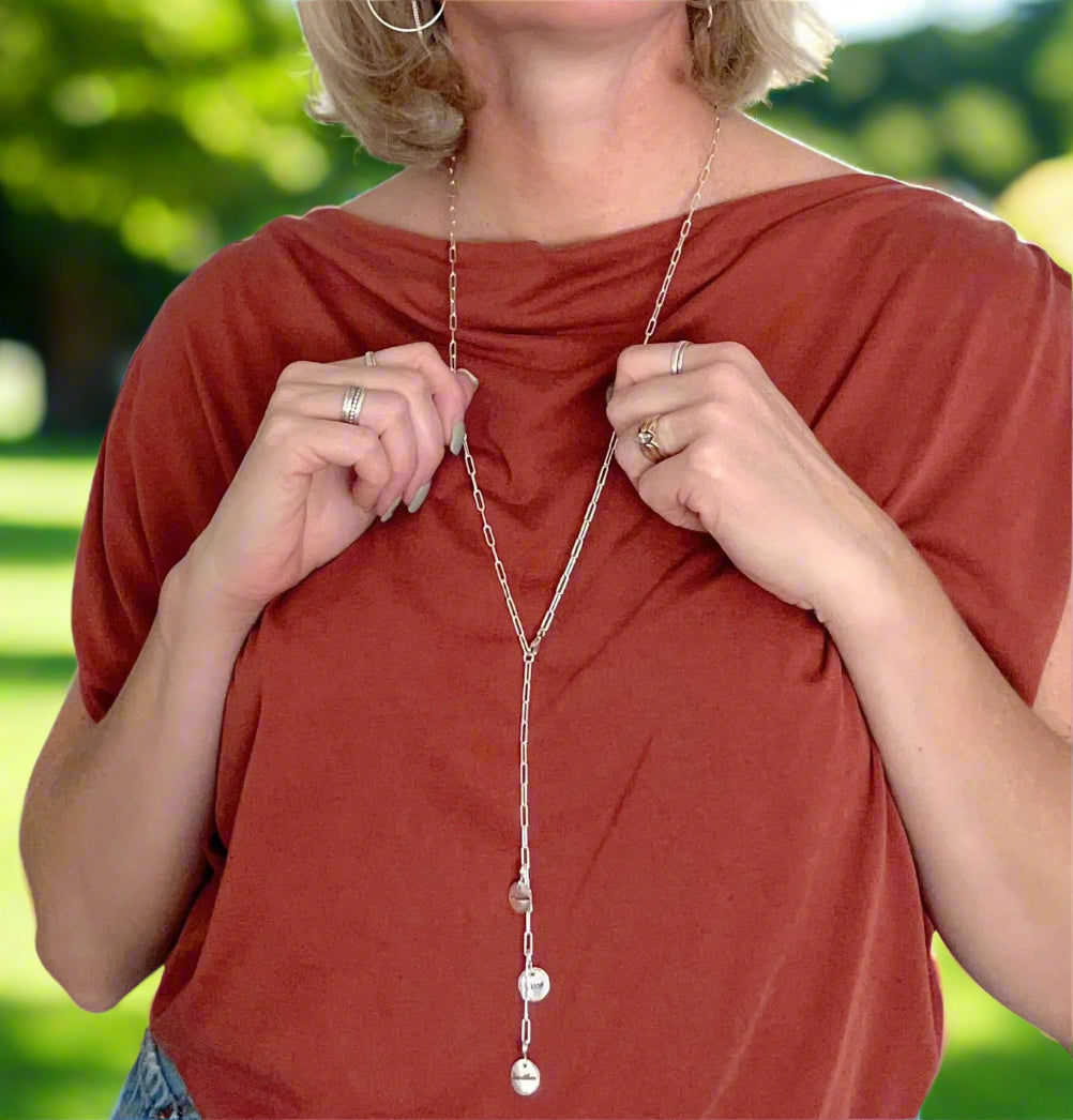 Sterling silver paperclip necklace with three custom 99.9% fine silver mini disc charms, designed for versatile wear as a long, short, lariat-style necklace or bracelet.