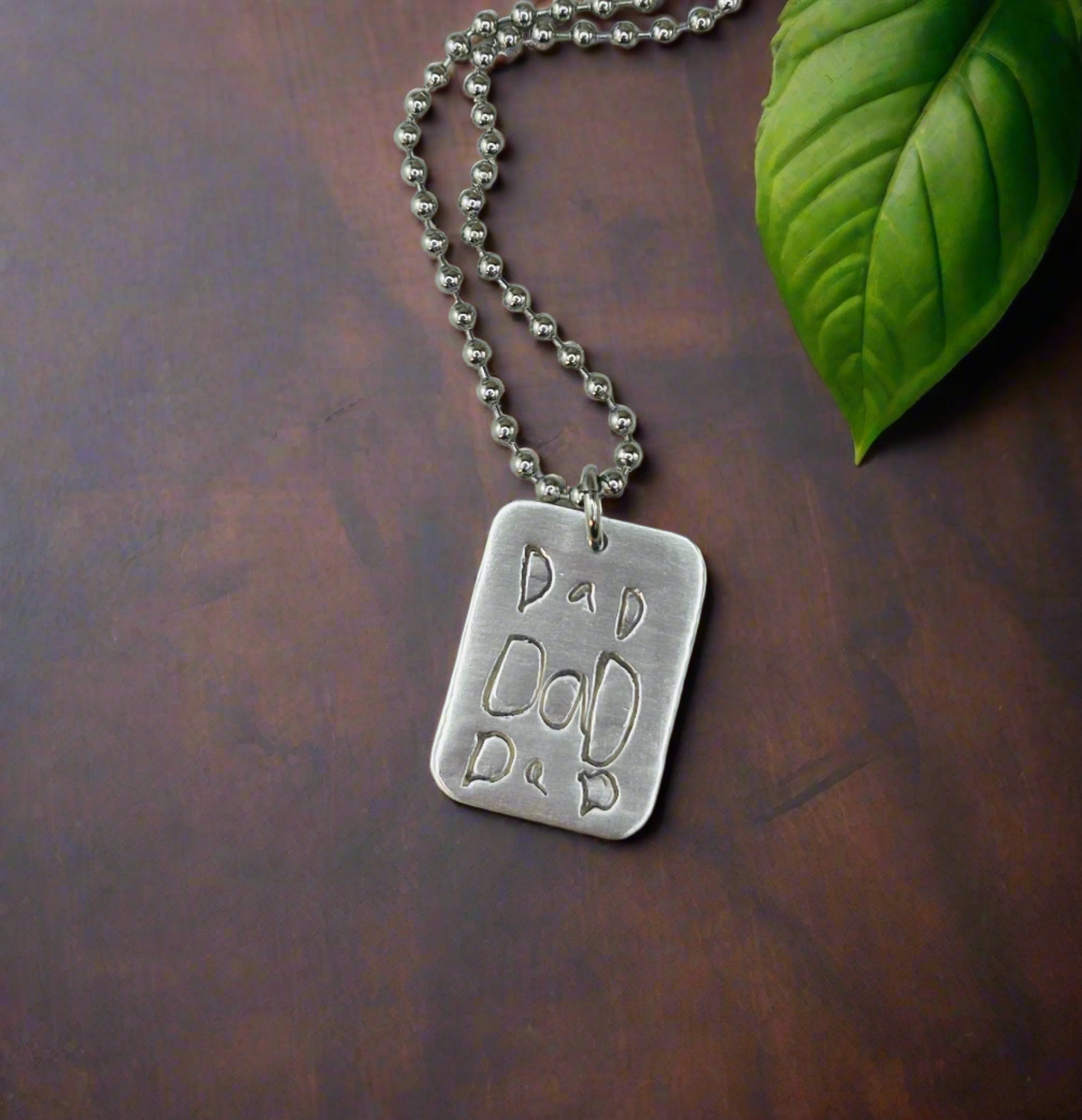 Fine silver dog tag pendant, personalized with up to 14 letters of custom or handwritten text from a letter or card—a sentimental gift for him.