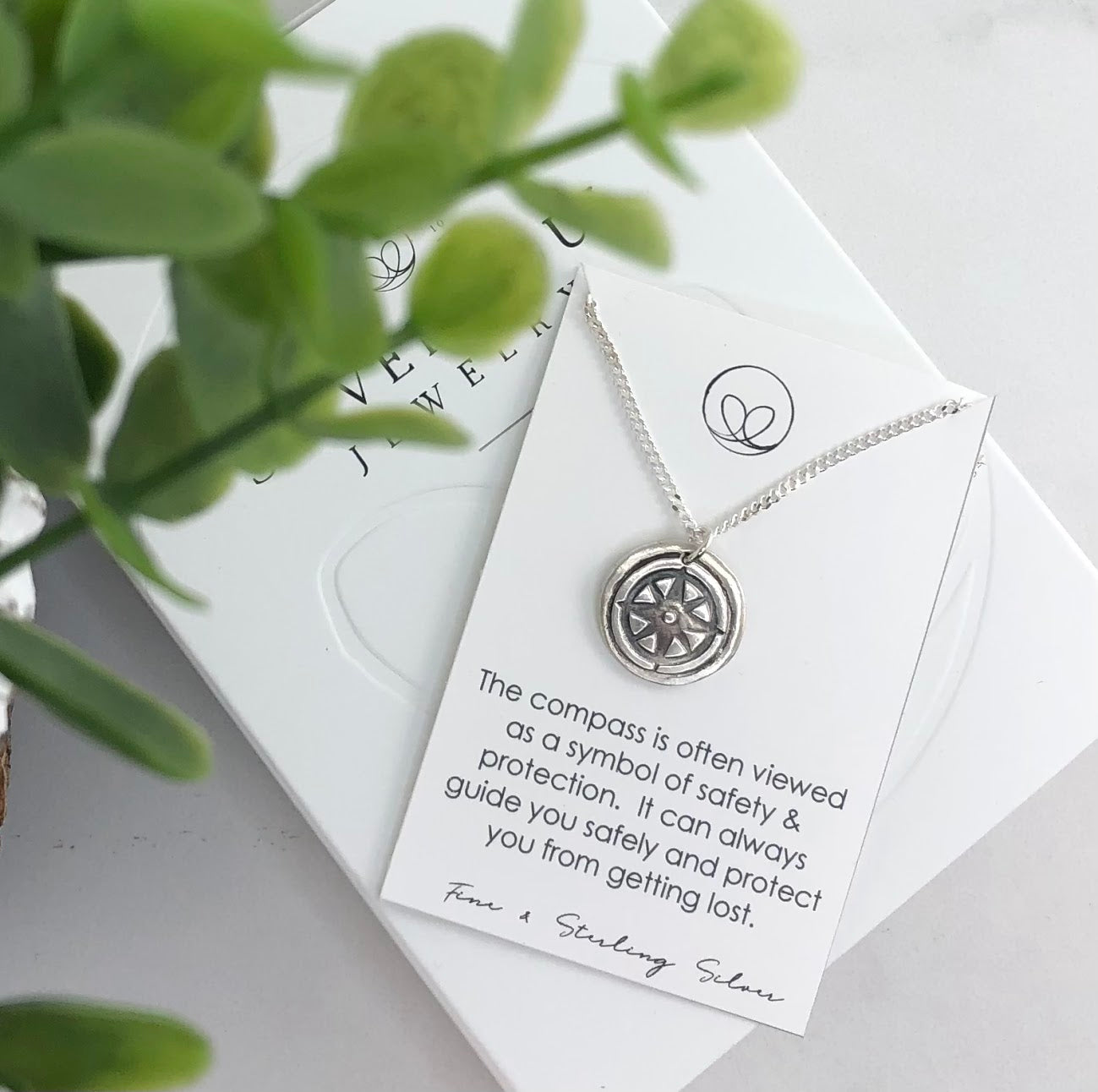 Handcrafted 99.9% pure silver compass pendant on an 18” curb chain, symbolizing safety, protection, and guidance—a timeless piece for any journey.