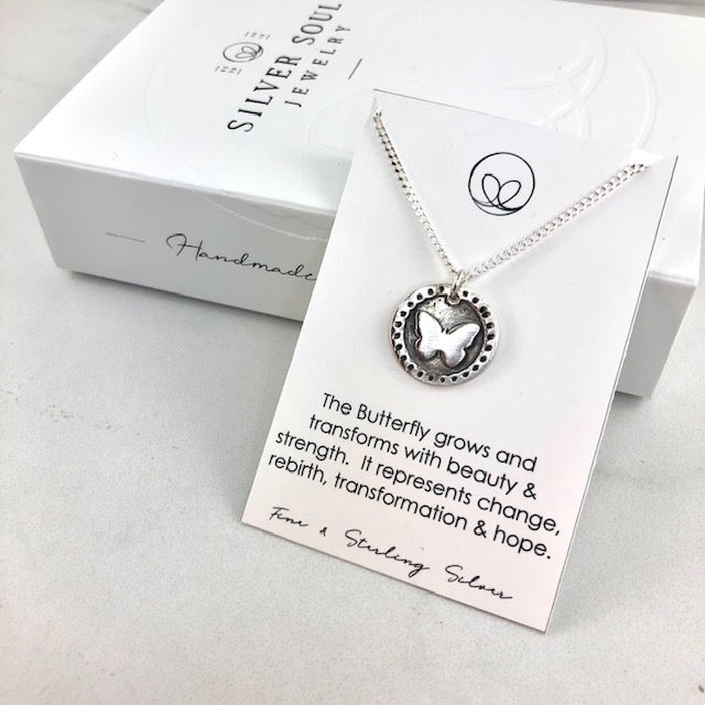 Fine silver butterfly necklace representing change and growth, handcrafted from 99.9% pure silver on an 18" sterling silver chain.