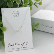 Sterling silver mother necklace with one beads, symbolizing love and connection. Handmade with care for a meaningful and sentimental keepsake.