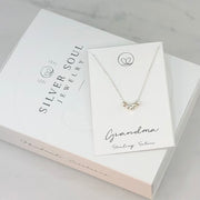 Sterling silver necklace for a grandmother, featuring delicate beads representing each grandchild—a meaningful and sentimental family keepsake.