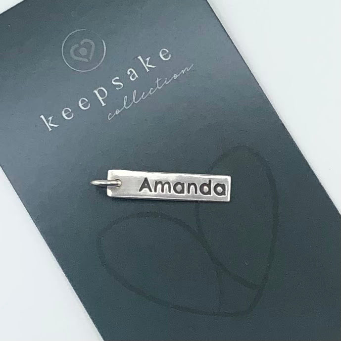 These handmade 99.9 pure silver name tags are great way to finish off any necklace or bracelet in the Keepsake Collection.