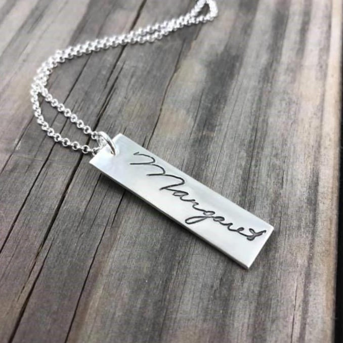 Rectangle shaped pendant repicating your loved ones handwriting.  Choose to add optional chain or embellishments.