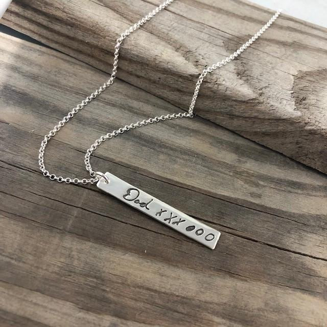 Rectangle shaped pendant repicating your loved ones handwriting.  Choose to add optional chain or embellishments.
