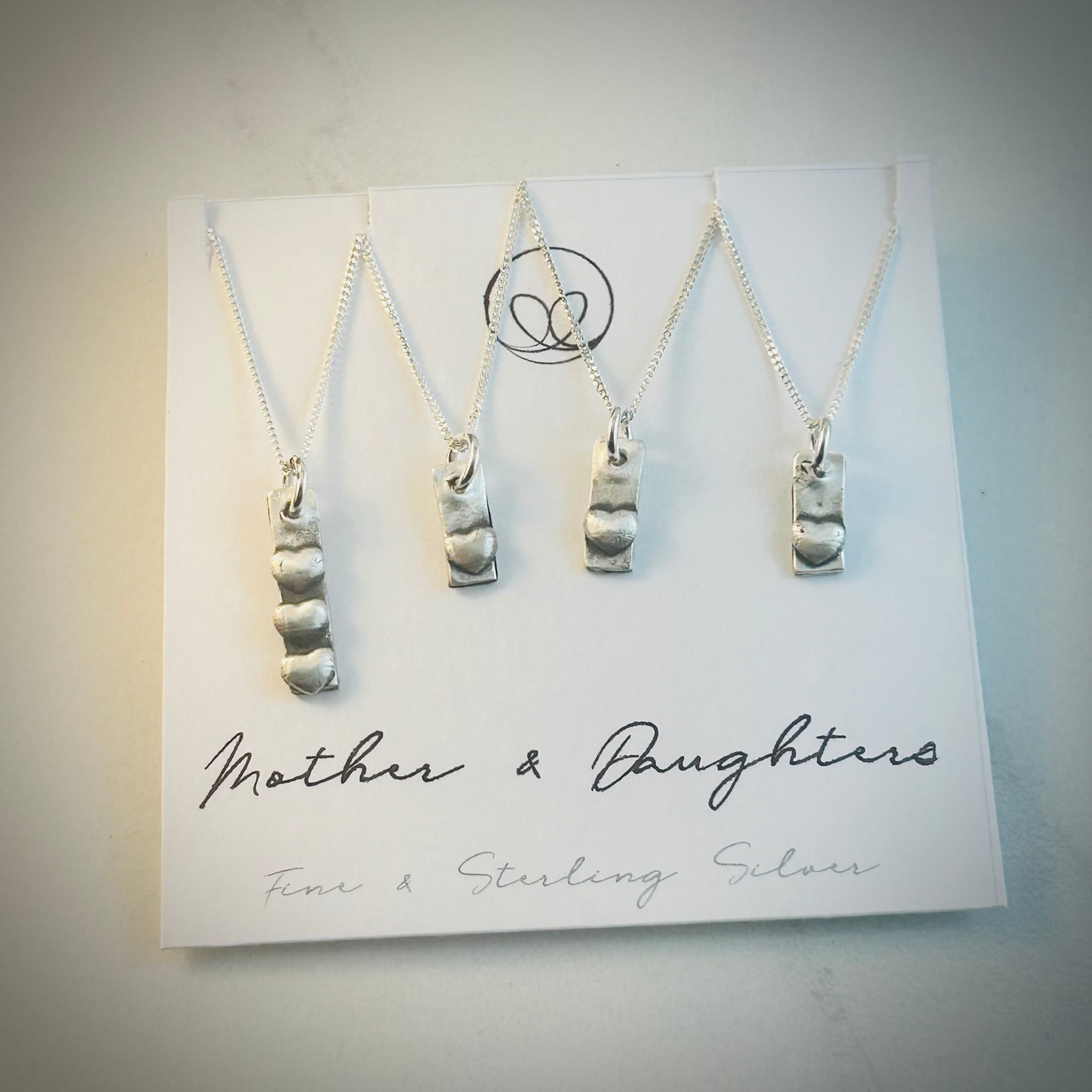 Mom and her 3 daughters (hearts)