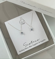 Sister necklace set with sapphire stones, uniquely placed to represent the older and younger sister—a timeless symbol of love and connection. This set includes 2 separate necklaces.