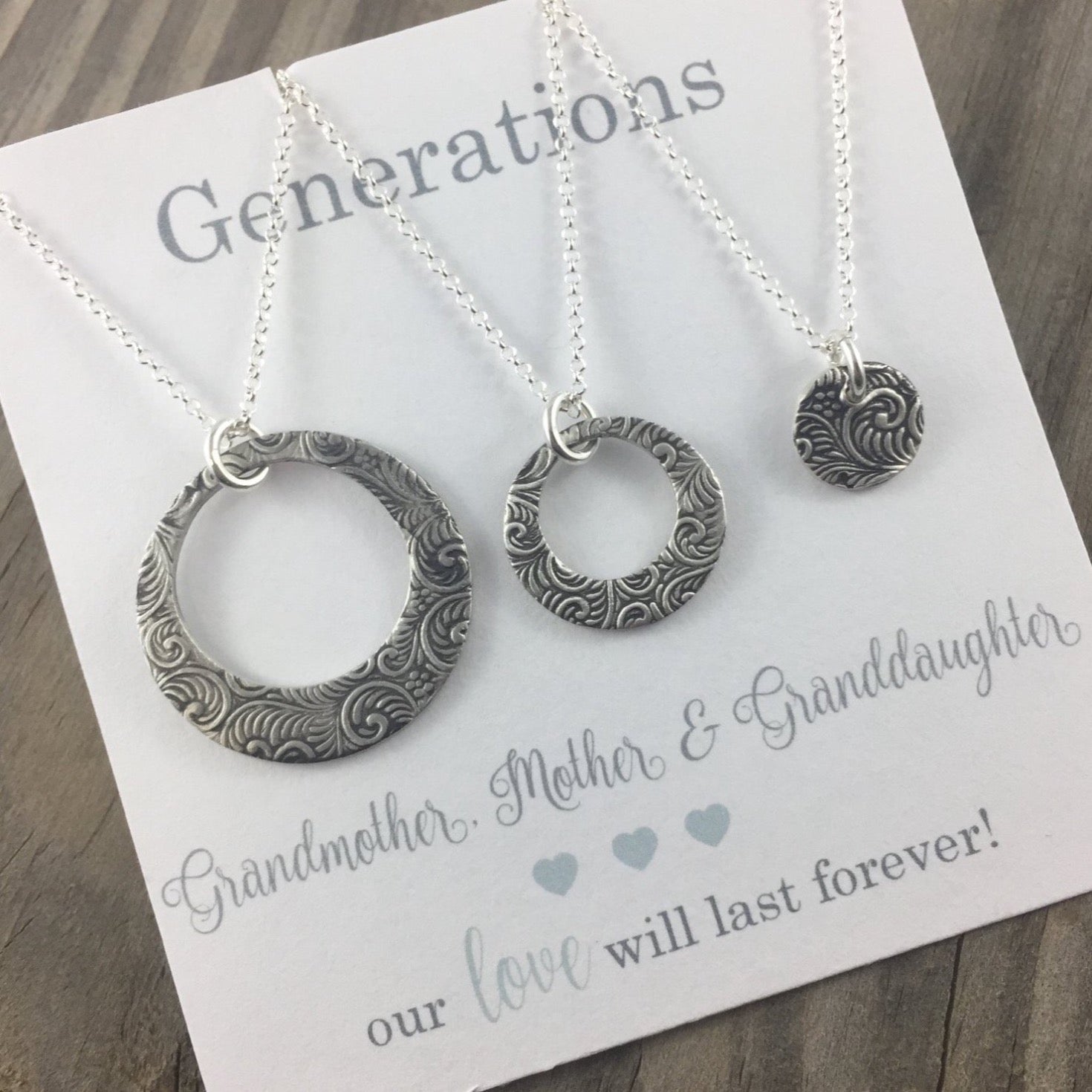 Celebrate the bond between mothers, daughters, and grandmothers with this handcrafted 99.9% silver necklace set. One necklace for each of you.