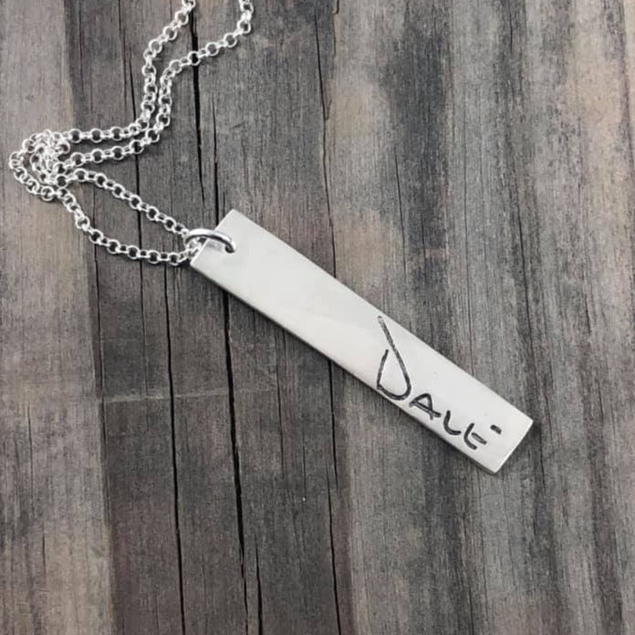 Rectangle shaped pendant repicating your loved ones handwriting.  Choose to add optional chain or embellishments.