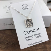 Cancer pendant on an 18" sterling silver chain.  The pendant is handmade with fine silver. 