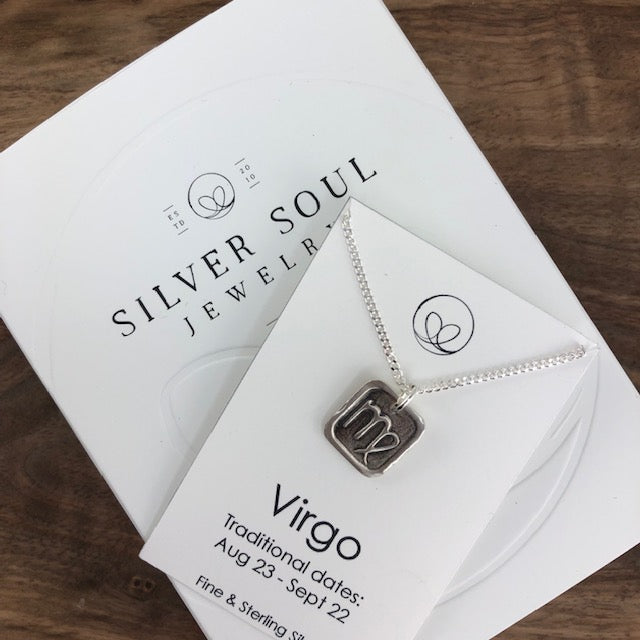 Virgo pendant on an 18" sterling silver chain.  The pendant is handmade with fine silver. 