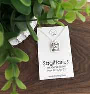 Sagittarious pendant on an 18" sterling silver chain.  The pendant is handmade with fine silver. 