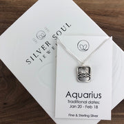Pisces pendant on an 18" sterling silver chain.  The pendant is handmade with fine silver. 