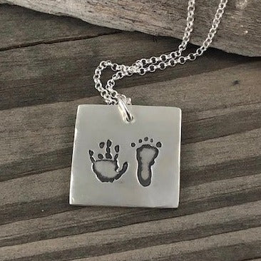 Fine silver square pendant showcasing actual hand and/or footprints. A meaningful keepsake, customizable with an optional chain or keyring.